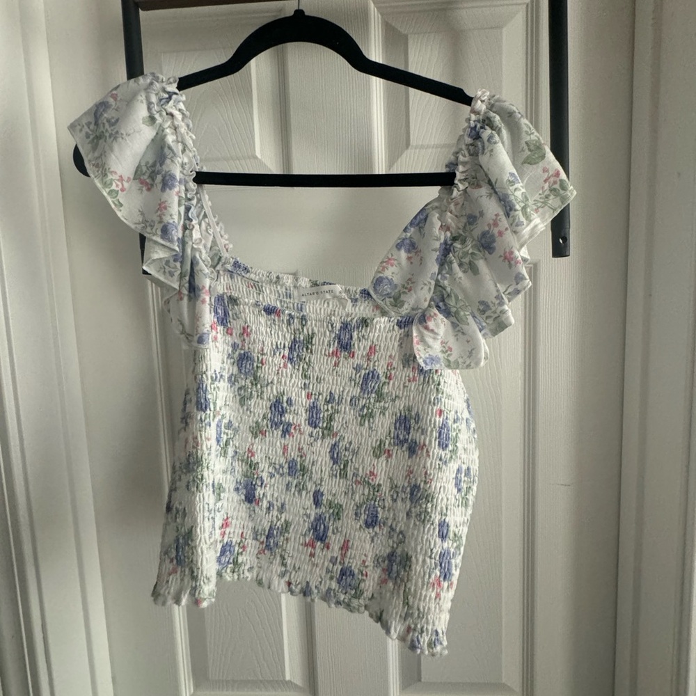 Altar’d State White tank with blue, pink, & green florals. Size XXL.